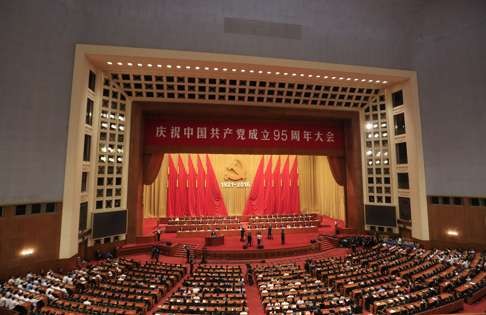 Leaders of the Communist Party celebrate its founding anniversary in the Great Hall of the People in Beijing on Friday. Photo: AP