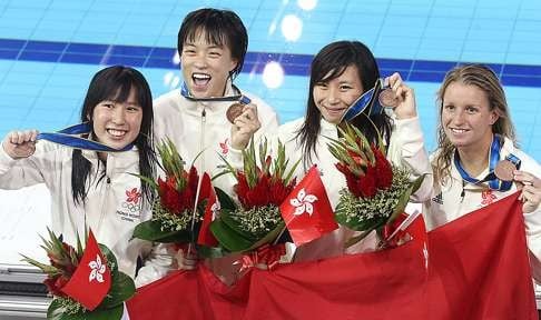 Claudia Lau (far left) was a bronze medallist along with Sze Hang-yu, Fiona Ma Hei-tung and Hannah Wilson in the 4x100 medley relay at the 2010 Asian Games in Guangzhou. Photo: K. Y. Cheng