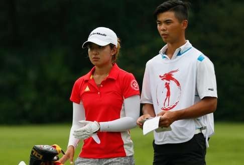 Tiffany Chan Tsz-ching with Steven Lam Tsz-fung at the Hong Kong Ladies Open at Hong Kong Golf Club.