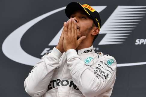 Mercedes driver Lewis Hamilton savours the moment at the Austrian Grand Prix. Photo: AFP