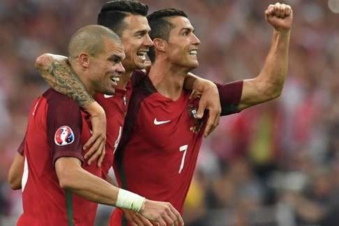 Portugal's Pepe, Fonte and Cristiano Ronaldo have Wales in their sights. Photo: AFP