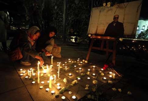 Iranians gathered to pay tribute to Kiarostami at Tehran's Museum of Cinema. Photo: AFP