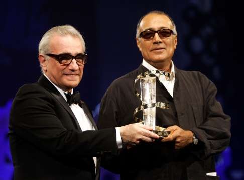 Kiarostami receives an award from Martin Scorsese during the closing ceremony of the 5th Marrakesh International Film Festival in Morocco in 2005. Photo: Reuters