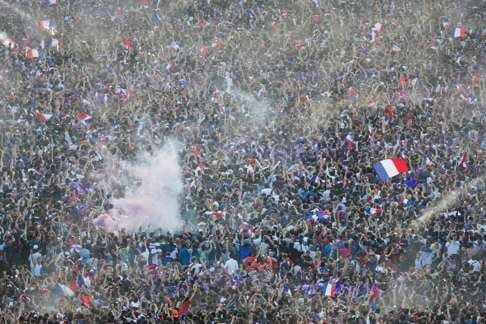 France supporters show their colours at the Paris Champs de Mars Fan Zone. Photo: AFP