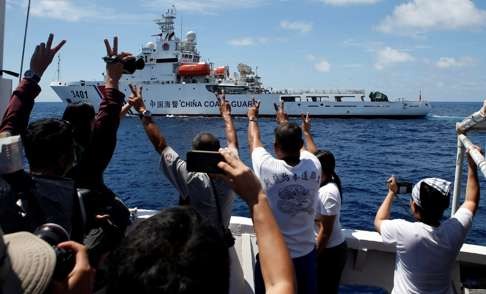 A Chinese Coast Guard vessel manoeuvres to block a Philippine government supply ship with members of the media aboard at the disputed Second Thomas Shoal, part of the Spratly Islands, in the South China Sea. Photo: Reuters