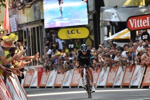 Out on his own: Chris Froome is well clear as he heads for the finish of the eighth stage. Photo: AFP