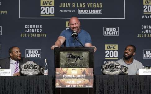 Dana White stands between Daniel Cormier (left) and Jon Jones ahead of UFC 200. Photo: AP