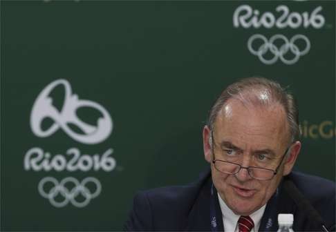 Peter Dawson, President of the International Golf Federation, talks at a news conference where it was confirmed that Jordan Spieth of the U.S. had removed himself from consideration for the 2016 Rio Olympics REUTERS/Russell Cheyne Livepic