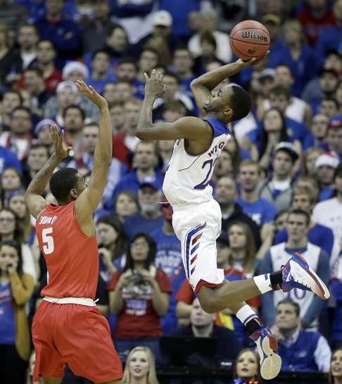 Andrew Wiggins played college basketball for the University of Kansas before becoming the number one overall pick in the 2014 NBA draft by the Cavaliers and was then traded to the Timberwolves. Photo: AP