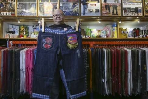 Shop owner John Wu at the XSXXL store, which sells large-sized menswear, in Kwai Chung. Photo: Nora Tam