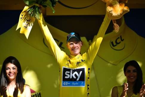 Chris Froome celebrates being the overall leader at the end of the 209km 16th stage. Photo: AFP