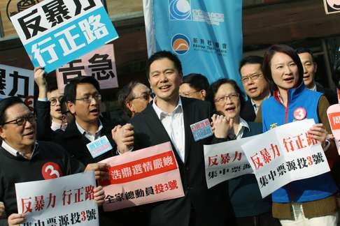 Holden Chow (centre) fighting the New Territories East by-election in February. Photo: Felix Wong