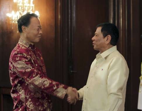 Chinese Ambassador to the Philippines Zhao Jianhua meets President Rodrigo Duterte after his inauguration ceremony last month. Photo: EPA