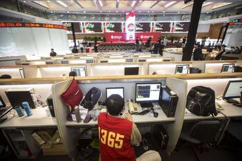 A trader at the Shanghai Stock Exchange. Photo: Bloomberg