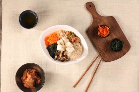 Vegetarian and tofu bibimbap with rice by Nosh.