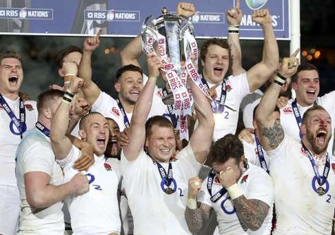 England celebrate with the trophy after their Six Nations success. Photo: Reuters