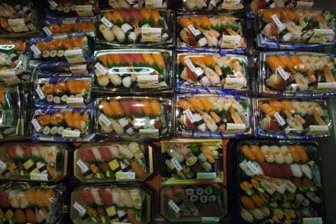 Pre-packaged sushi is displayed at a ThreeSixty supermarket in Hong Kong. Hong Kong offers a wide range of seafood to consumers, in both sustainable and unsustainable varieties. Photo: EPA