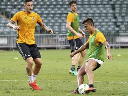 Juventus striker Paulo Dybala (right) will be one of the players to watch on Saturday afternoon.