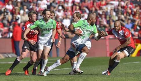 Patrick Osborne of the Highlanders and Lionel Mapoe of the Lions. Photo: EPA