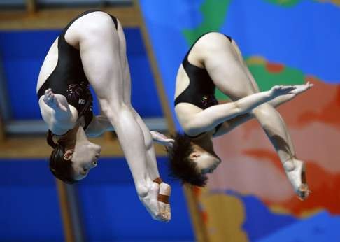 Shi Tingmao and Wu Minxia compete in July 2015. Photo: AP