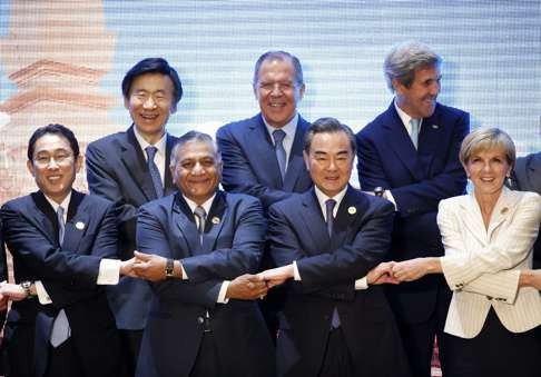 A group photo taken at the East Asia Summit foreign ministers’ meeting in Vientiane, Laos. The family of nations, more particularly the US and China, should rise above the fray to resolve the issues of the Western Pacific. Photo: EPA