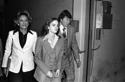 Hearst in San Francisco on April 12, 1976, after she was sentenced to seven years in prison for bank robbery.