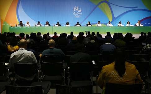 epa05452330 Athletes attend a press conference of the Olympic refugee team prior to the Rio 2016 Olympic Games in Rio de Janeiro, Brazil, 02 August 2016. Ten refugee athletes, five runners from South Sudan, two Syrian swimmers, two Congolese judokas and a marathon runner from Ethiopia, will form a team set to compete in the Rio 2016 Olympics, which will take place from 05 August until 21 August 2016 in Rio de Janeiro. EPA/LARRY W. SMITH
