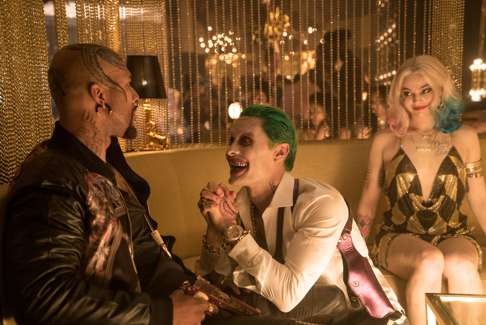 Jared Leto (middle) as the Joker and Margot Robbie as Harley Quinn in Suicide Squad.