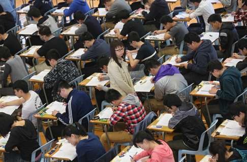 Students sit the HKDSE exam at Kowloon Technical School in Sham Shui Po.