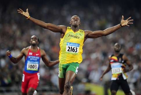 Usain Bolt of Jamaica celebrates winning the men's 200m final in a new world record at the Beijing 2008 Olympic Games on August 20, 2008. Photo: Reuters