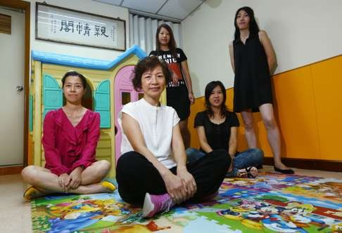 (Left to right) Pak Po-ling, Leung Shui-fong, Gloria Jam Sze-hang, Chan Kit-man and Eva Poon Wai-yee at Against Child Abuse in Tuen Mun. Photo: Edmond So