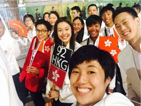 Badminton star Yip Pui-yin takes a selfie of the Hong Kong team before they enter the stadium. (From L-R) Swimmer Sze Hang-yu, chef de mission Kenneth Fok, rower Lee Ka-man, flag bearer Stephanie Au, rower Lee Yuen-yin, sailor Sonia Lo, rower Chiu Hin-chun and swimmer Geoffrey Cheah. Photo: Hong Kong Olympic delegation
