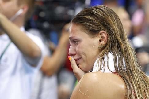 Yulia Efimova cries after finishing second in the women's 100m breaststroke final. Photo: AFP