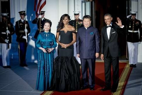 First ladies Peng Liyuan and Michelle Obama stand beside President Xi Jinping and US President Barack Obama on the North Portico of the White House in September 2015 during Xi’s state visit to the US. Photo: Bloomberg
