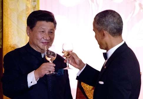 President Xi Jinping and US President Barack Obama exchange toasts during a state dinner at the White House in Washington in September 2015. Photo: EPA