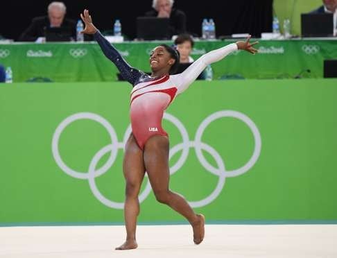 Simone Biles performs her floor routine in the women's team competition. Photo: Washington Post photo by Jonathan Newton