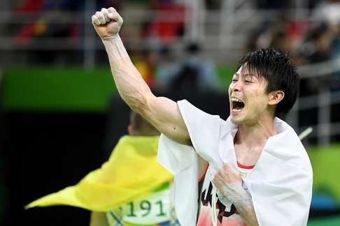 Uchimura celebrates winning his gold medal in the men’s individual all-around final. Photo: TNS