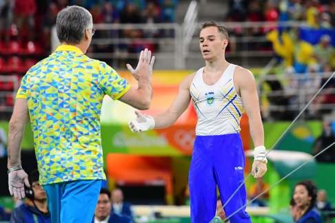 Verniaiev reacts after competing in the horizontal bar event of the men’s individual all-around final. Photo: AFP