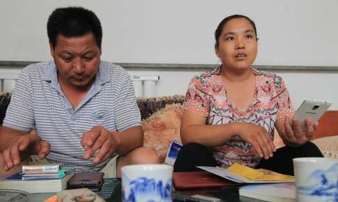 Zheng Guangliang’s parents Zheng Guohua (left) and Zhang Zhao. Photo: SCMP Pictures