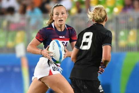 USA’s Kathryn Johnson runs with the ball. Photo: AFP
