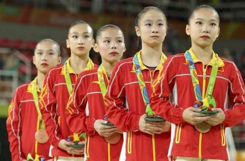 China’s gymnastics team of Wang Yan, Mao Yi, Shang Chunsong, Fan Yilin and Tan Jiaxin took the bronze medal. Photo: Reuters