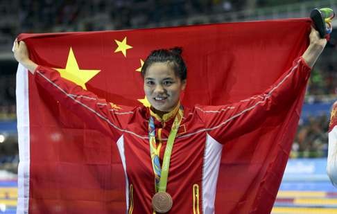 Shi Jinglin earlier claimed bronze for China in the 200m breaststroke. Photo: Reuters