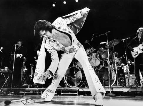 Elvis wore extravagant flared jumpsuits in the 1970s, often paired with glittering boots.