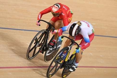 Russia's Anastasiia Voinova (right) edges China's Zhong Tianshi in the women's sprint. Zhong later won a repêchage to move through to the quarter-finals. Photo: AFP