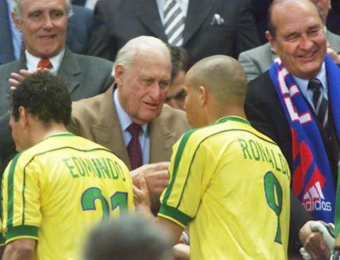 On July 12, 1998, Joao Havelange congratulates Brazilian forward Ronaldo as French president Jacques Chirac smiles at the Stade de France, after the French saide defeated Brazil 3-0 in the 1998 Football World Cup final. Photo: AFP