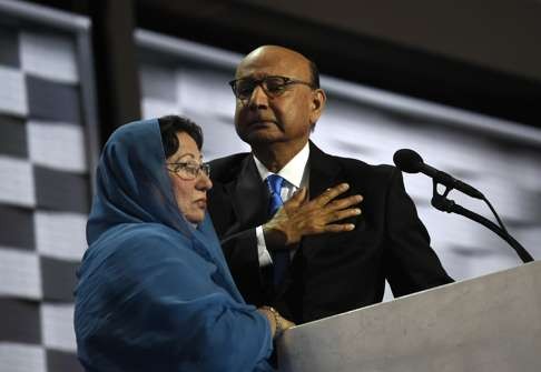 Khizr Khan addresses the Democratic National Convention in Philadelphia with his wife, Ghazala, by his side on July 28. Their son, Humayun S. M. Khan, a US Army captain, was killed by a car bomb in Iraq in 2004. Photo: The Washington Post