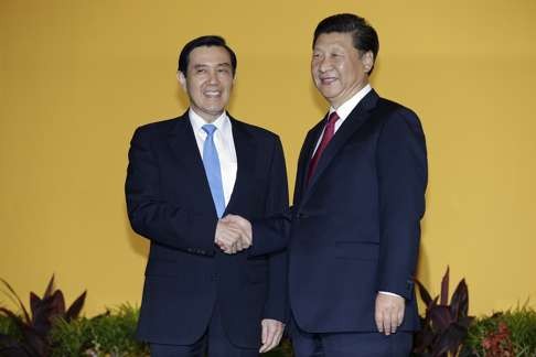 Xi Jinping and then Taiwanese president Ma Ying-jeou shake hands in Singapore on November 7, 2015, at the start of a historic meeting marking the first top-level cross-strait contact since the 1949 civil war. Photo: AP