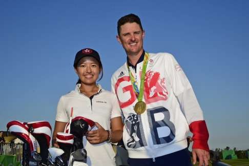 Chan grabbed a photo opportunity with Olympic men’s golf gold medallist Justin Rose after he sealed his win. Photo: SCMP Pictures