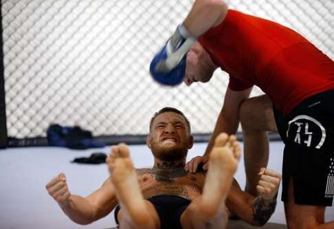 McGregor trains during an open workout at his gym. Photo: AFP