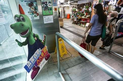 An advertisement featuring Ah Tak at Centre Street Market on Hong Kong Island on August 11. Photo: Jonathan Wong